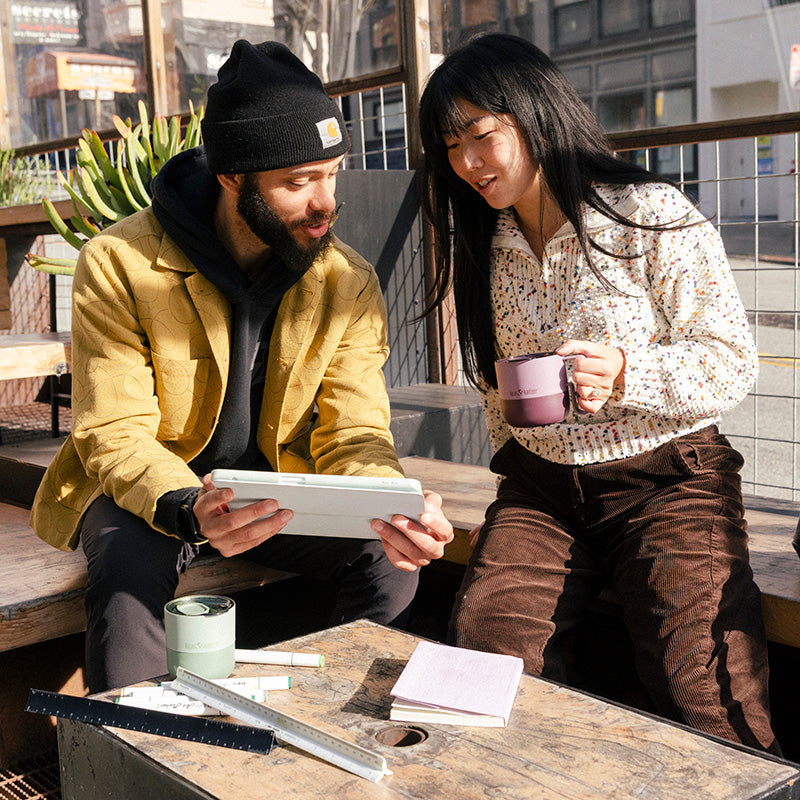 12oz-rise-mug-m2 12oz_rise_coffee_mug_dusty_orchid_couple_city_patio_square.jpg
