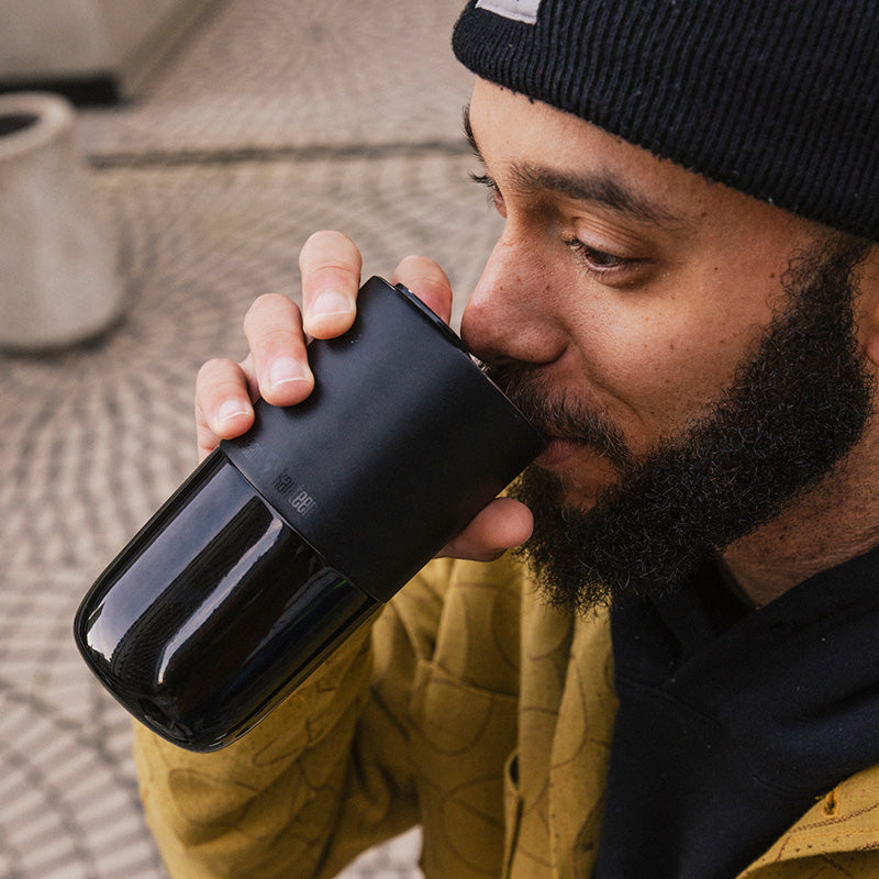 daily-on-the-go-set-m4 16oz_rise_tumbler_black_man_drink_square.jpg