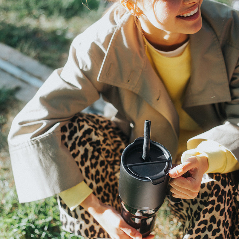 26oz-rise-tumbler-with-straw-lid-w9 26oz_rise_tumbler_black_woman_topview_square.jpg
