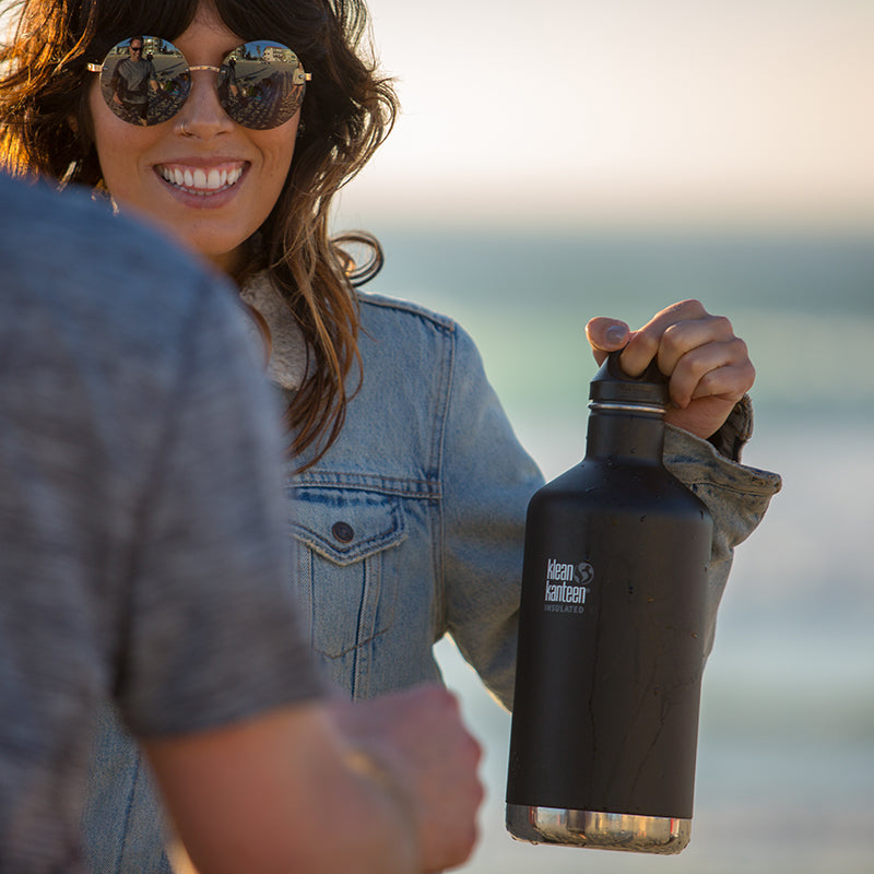 64oz-classic-with-loop-cap-n0 64oz_insulated_classic_black_beach_girl_hand_square.jpg