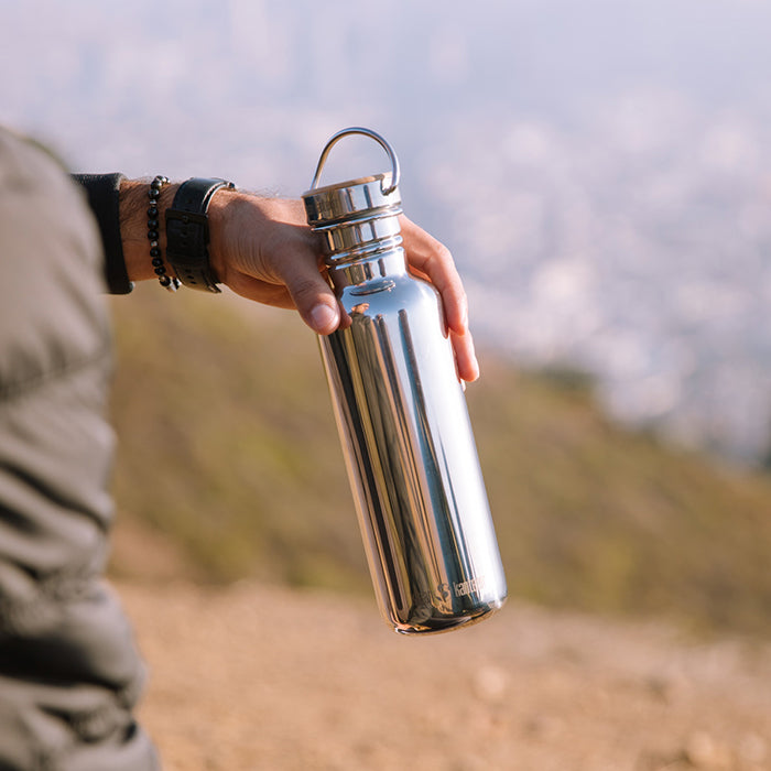 27oz-reflect-with-bamboo-cap-g1 K27SSLRF-MS-BAMBOO_reflect_bottle_hand_lifestyle.jpg