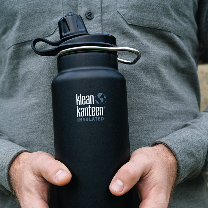 tkwide-chug-cap-d2 K32TKWSSL-SB-Craddled-Bottle_closeup_lifestyle.jpg