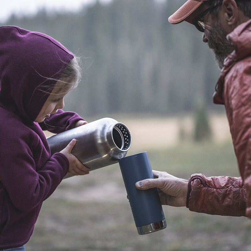 64oz-tkwide-with-loop-cap-q4 tkwide_64oz_bottle_girl_dad_filling_square.jpg